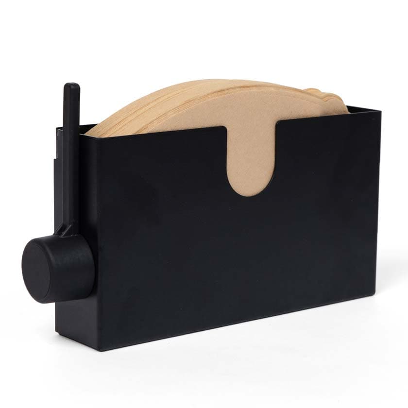 Musta suodatinpussiteline ja kahvimitta miiko suomalainen design